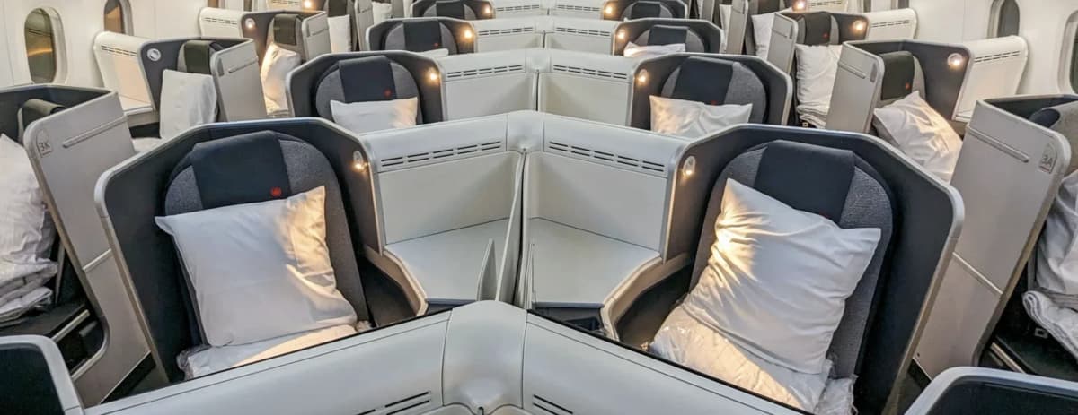 Air Canada Signature Class business cabin — herringbone reverse-1-2-1 layout on the 787-9, redemption target for Aeroplan distance-based chart